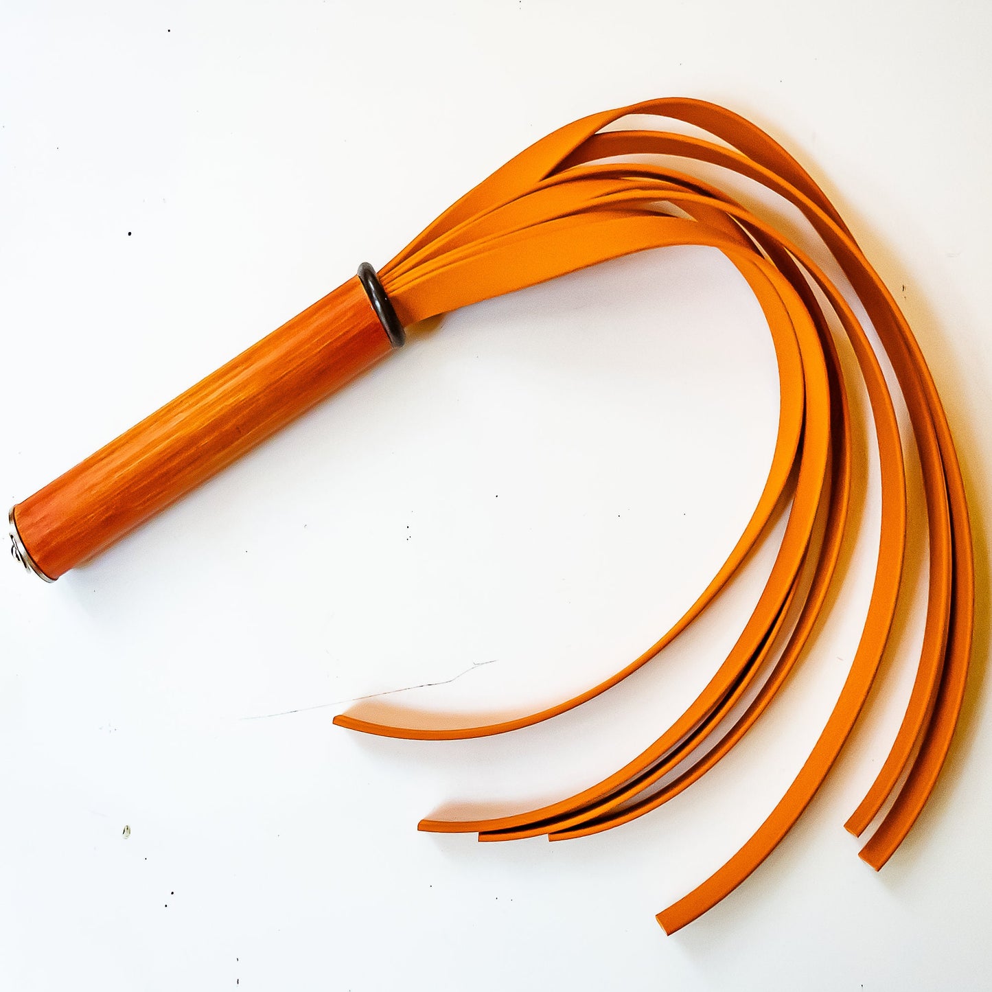 Pop Art/Orange. 61cm/24" BioThane whip with 7 strands