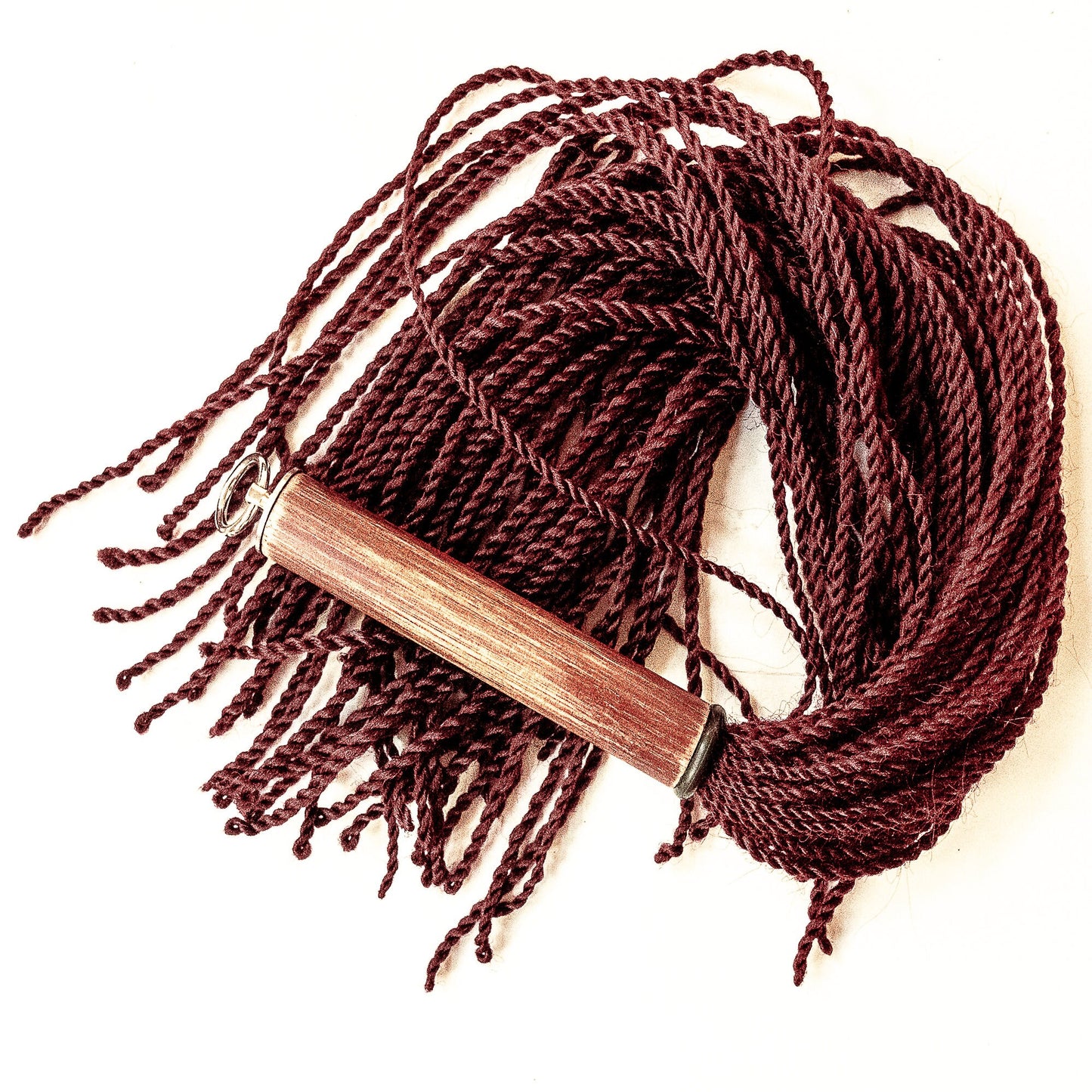 Malaika/Umbra. 69cm/27" flogger with 60 braids of artificial hair
