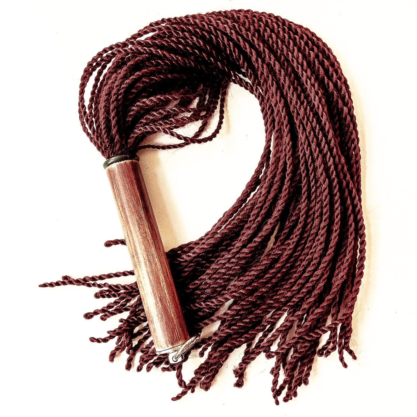 Malaika/Umbra. 69cm/27" flogger with 60 braids of artificial hair