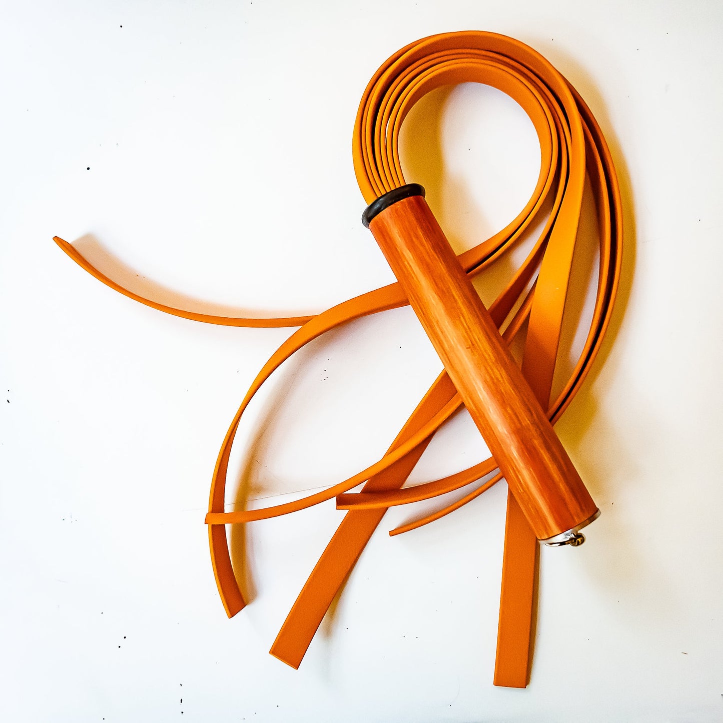 Pop Art/Orange. 61cm/24" BioThane whip with 7 strands