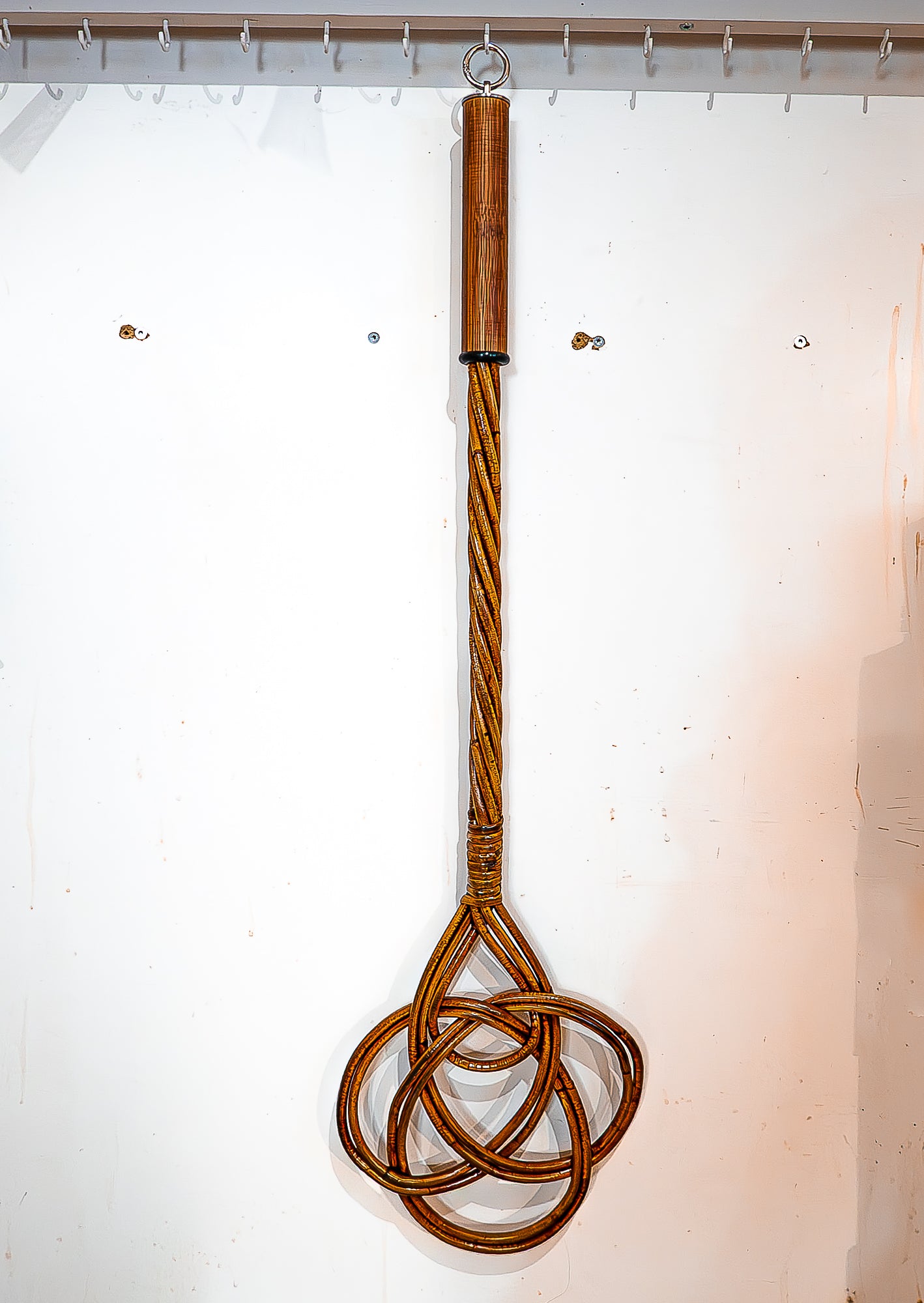 Domestic violence / Mahogany. 76cm/30" carpet beater.