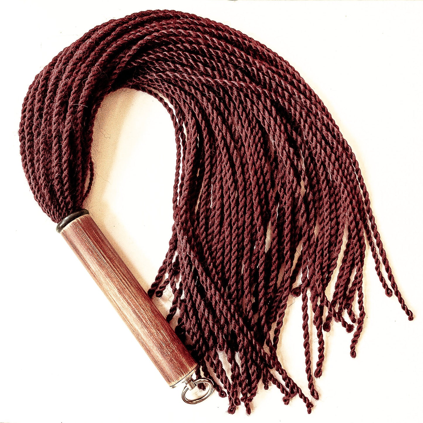Malaika/Umbra. 69cm/27" flogger with 60 braids of artificial hair