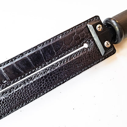 Tawse/Ostrich/Black. 51cm/20", double-tongued paddle made of layered leather with carbon inlay