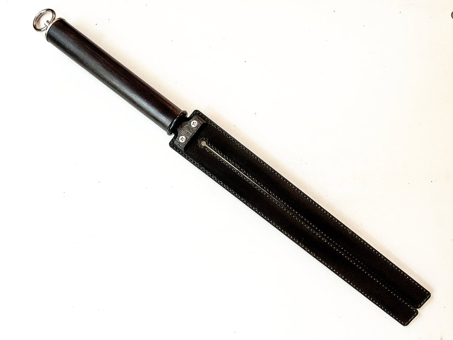 Tawse/Slim/Black. 51cm/20", two-pronged paddle made of 2 x 2mm leather with carbon inlay