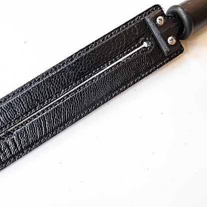 Tawse/Ostrich/Black. 51cm/20", double-tongued paddle made of layered leather with carbon inlay