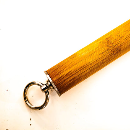 Tawse/Ostrich/Light Amber. 51cm/20", double-tongued paddle made of layered leather with carbon inlay