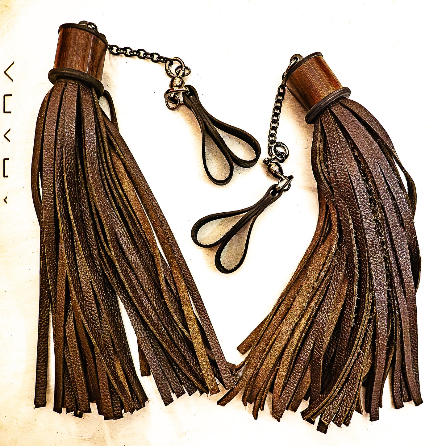 POI/Schoko Fingerflogger (Paar, je 33cm Leder +  25cm Fingerschlaufen und Kette)