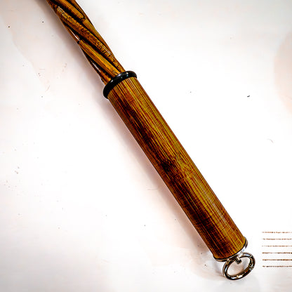 Domestic violence / Mahogany. 76cm/30" carpet beater.