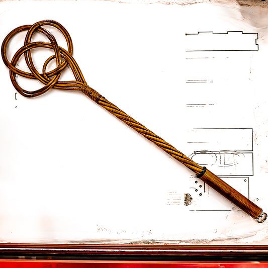 Domestic violence / Mahogany. 76cm/30" carpet beater.