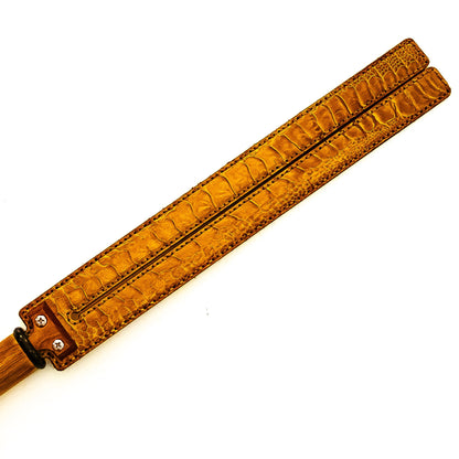 Tawse/Ostrich/Light Amber. 51cm/20", double-tongued paddle made of layered leather with carbon inlay